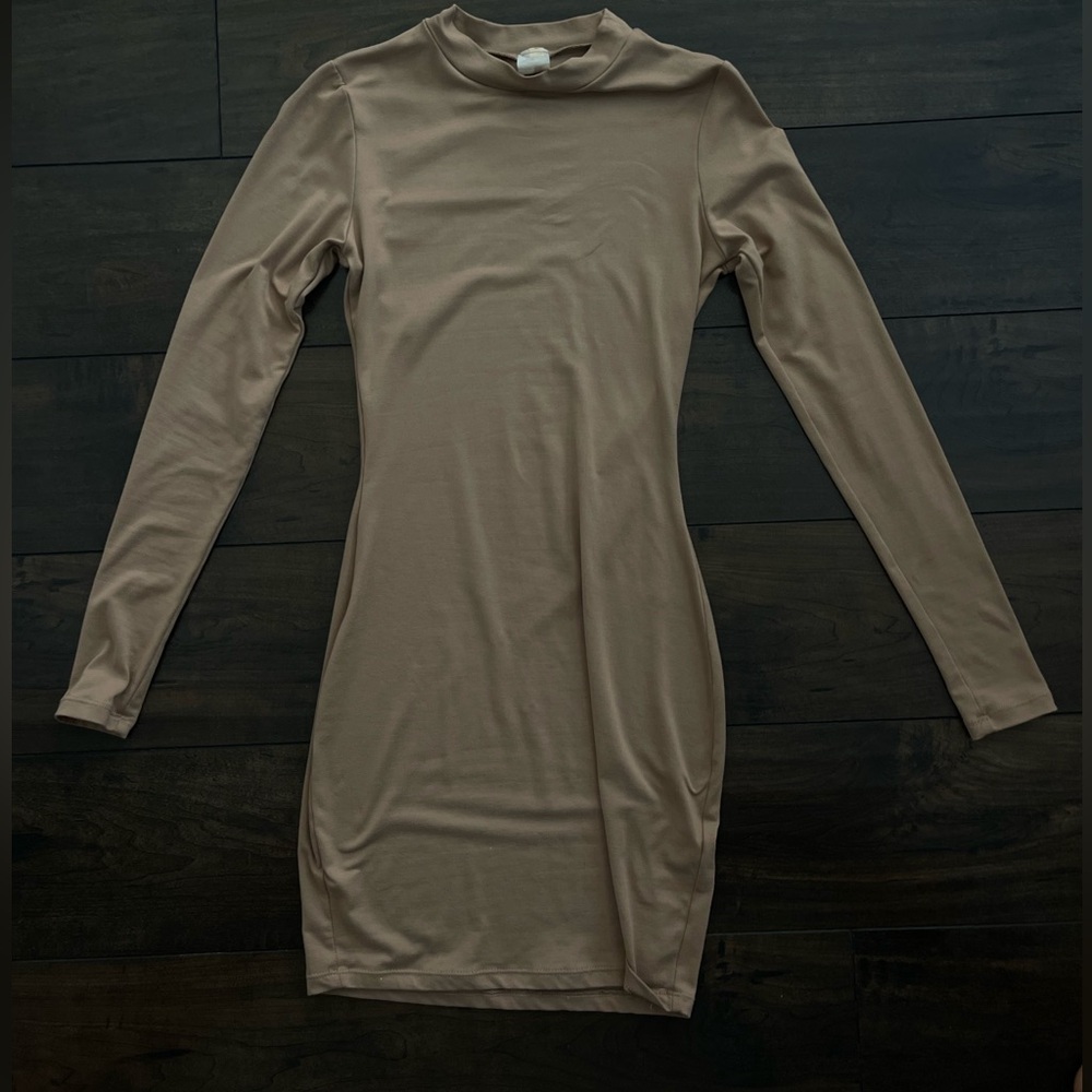 Brown body con long sleeve dress.